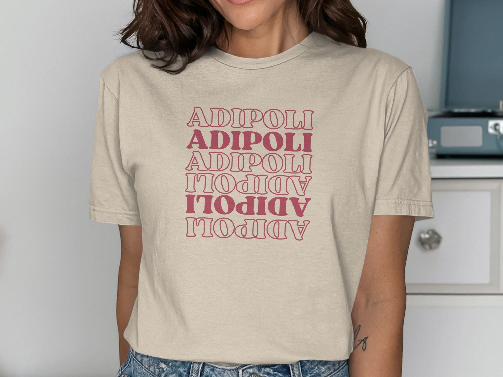 Adipoli Graphic Tee with Stacked Text Design