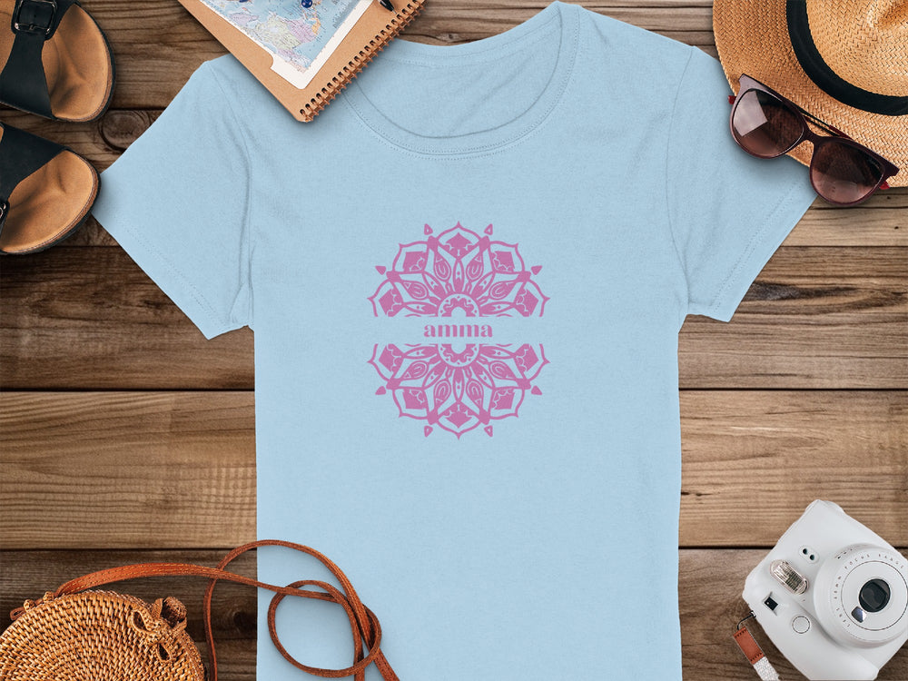 Intricate Pink Mandala Design on Light Blue Shirt