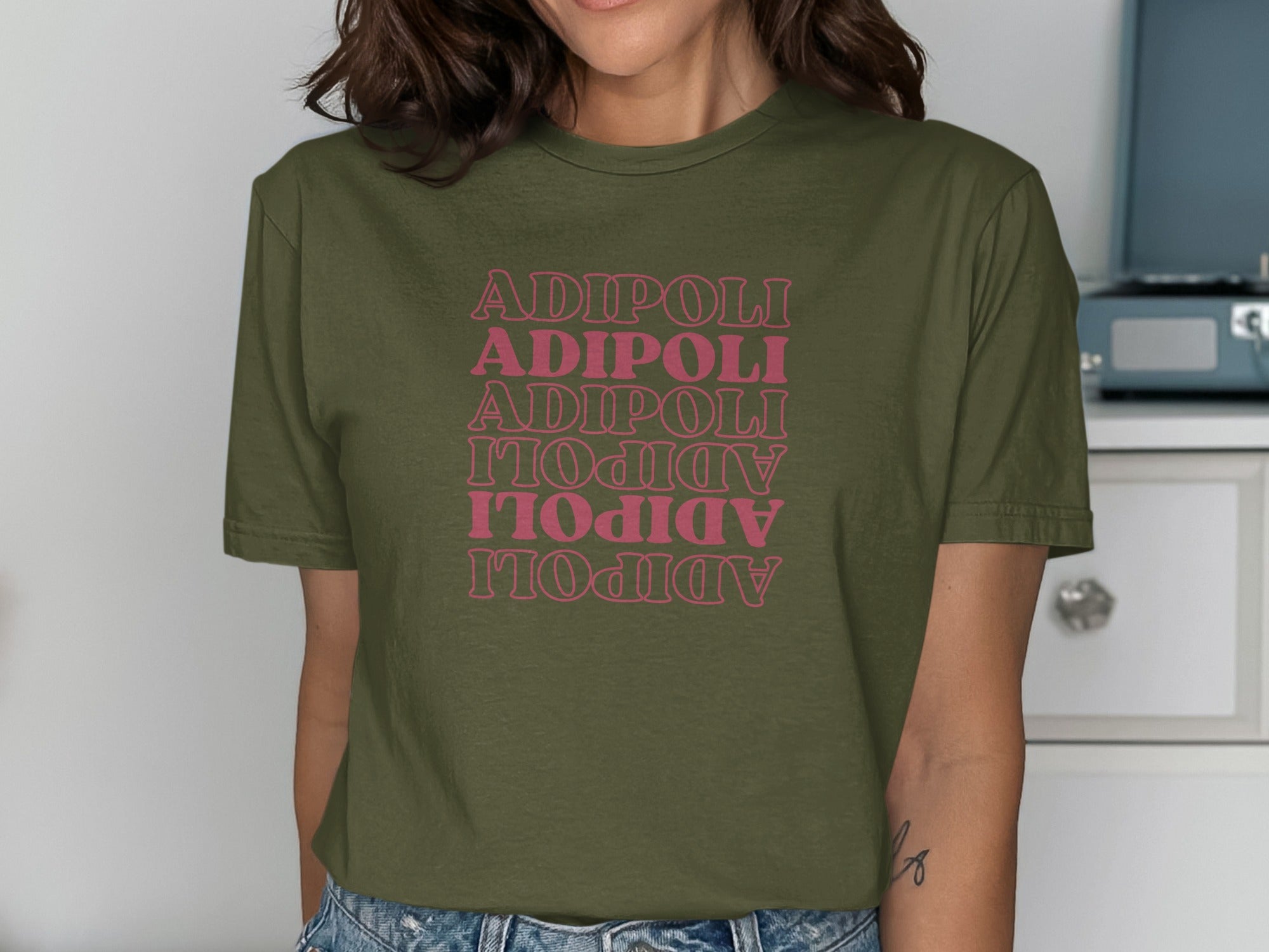 Adipoli Graphic Tee with Unique Bold Text Design