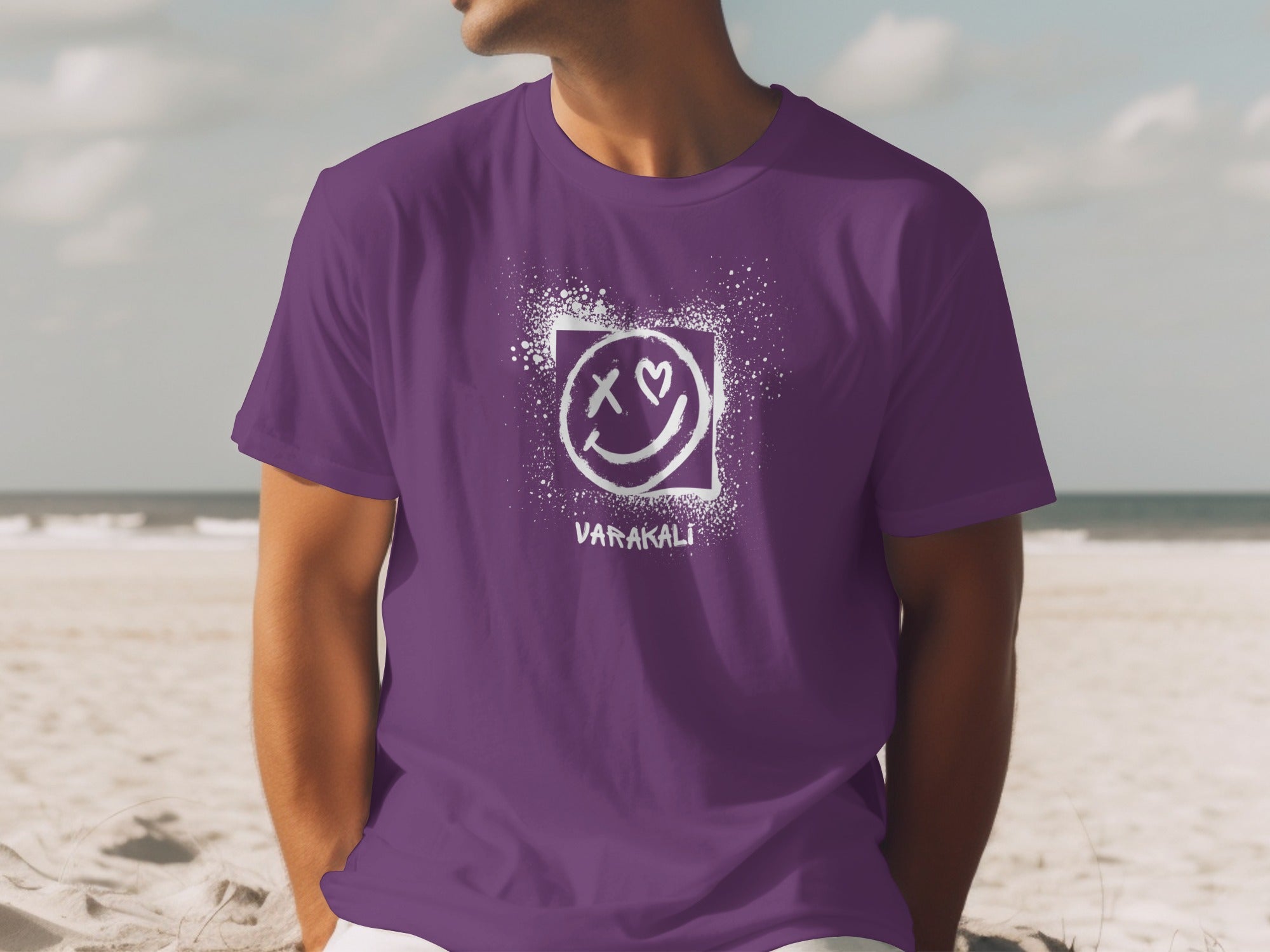 Smiling Face Graphic Design on Purple Tee