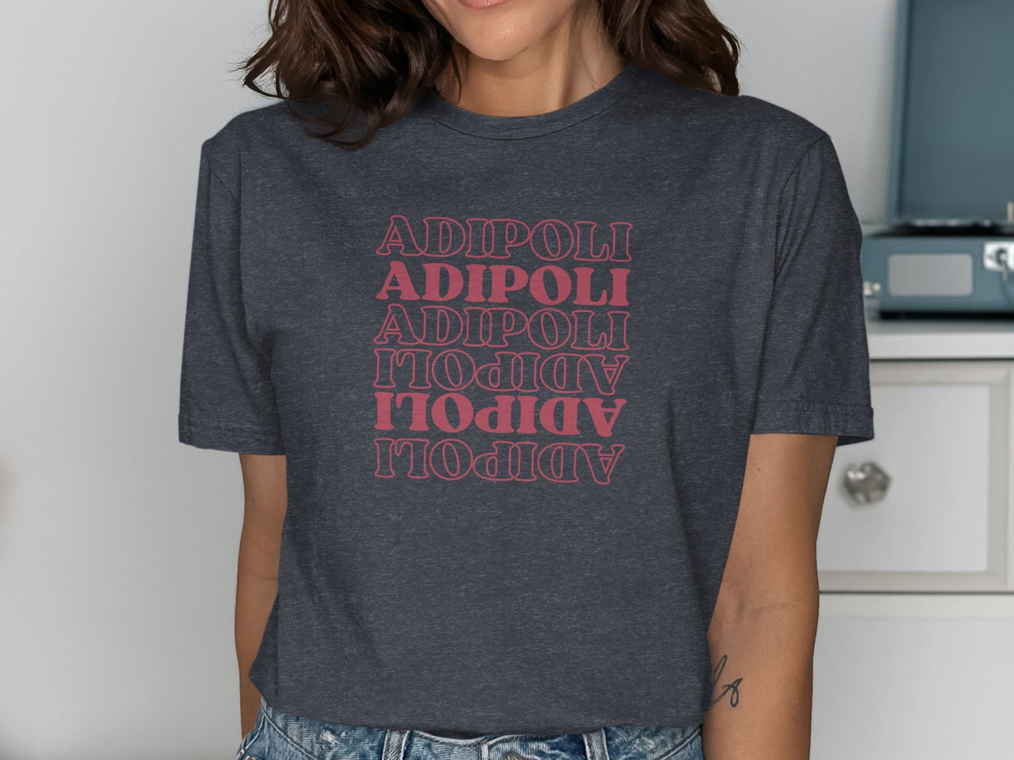 Adipoli Graphic Tee with Bold Red Text Design