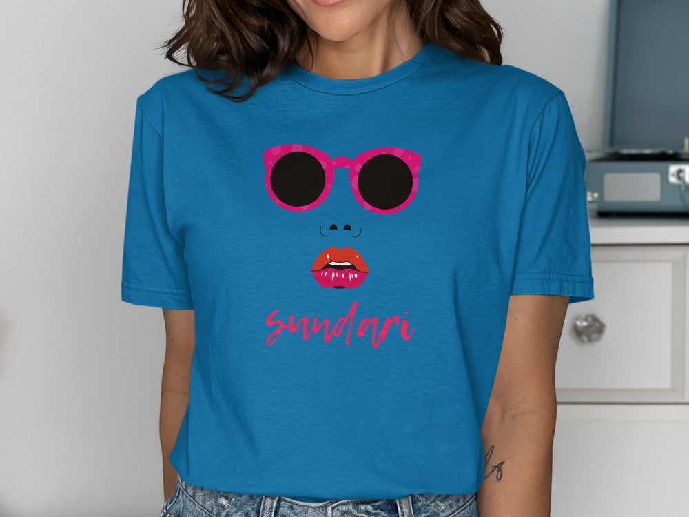 Blue T-Shirt Featuring Bold Sunglasses Graphic Design