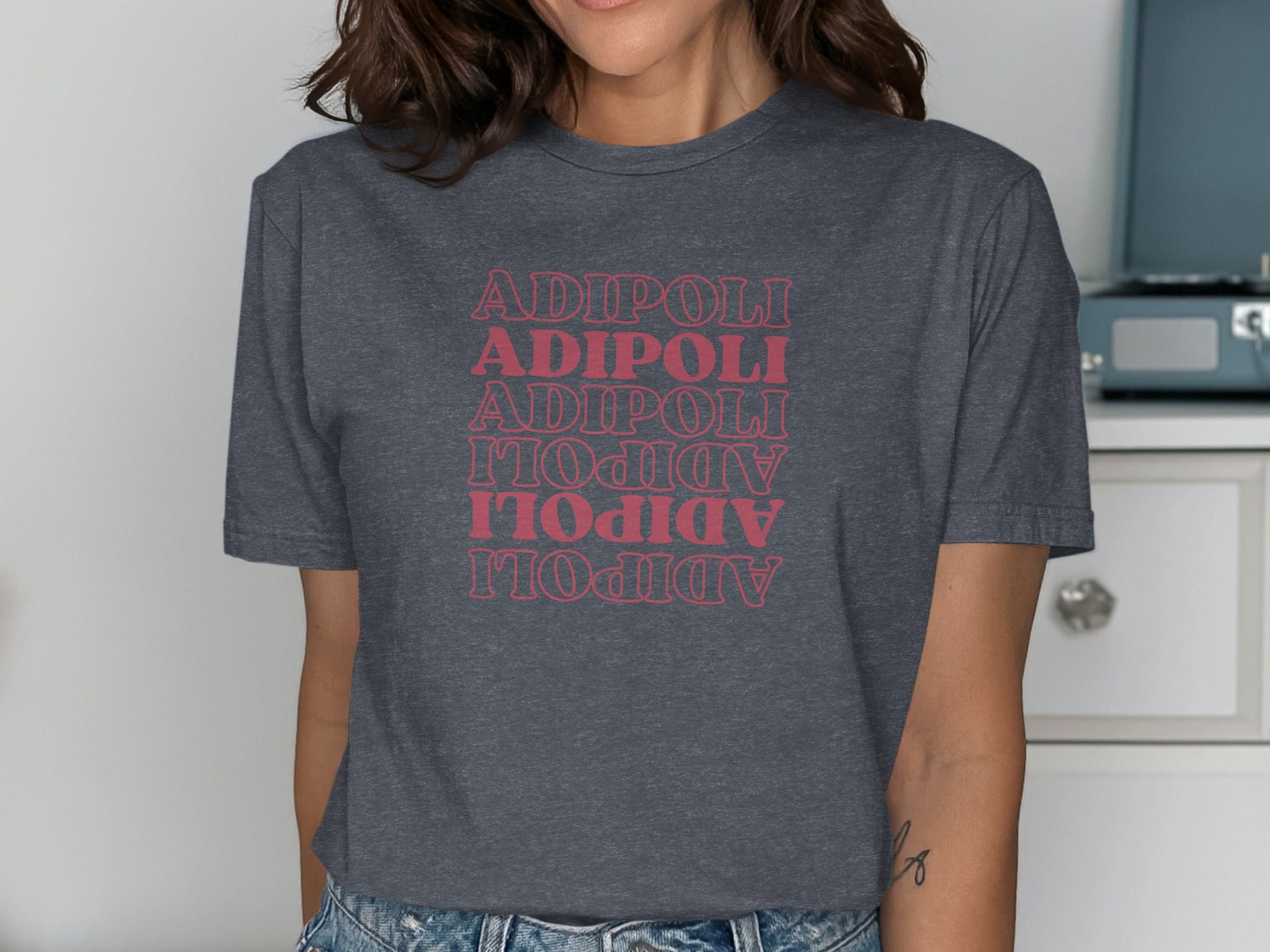 Adipoli Graphic Tee with Unique Text Design