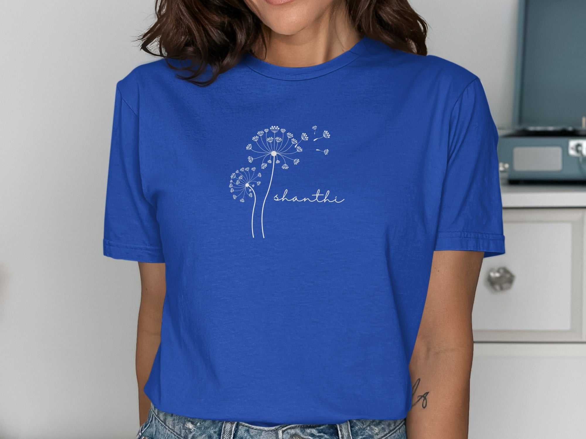 Blue Tee with Dandelion and Shanti Script Design